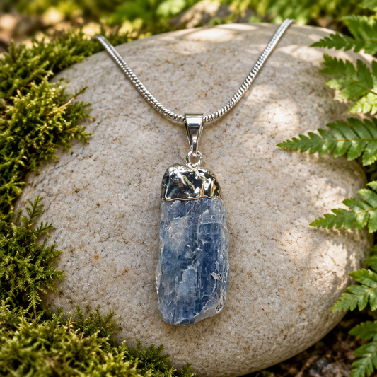 Kyanite pendant in a natural setting